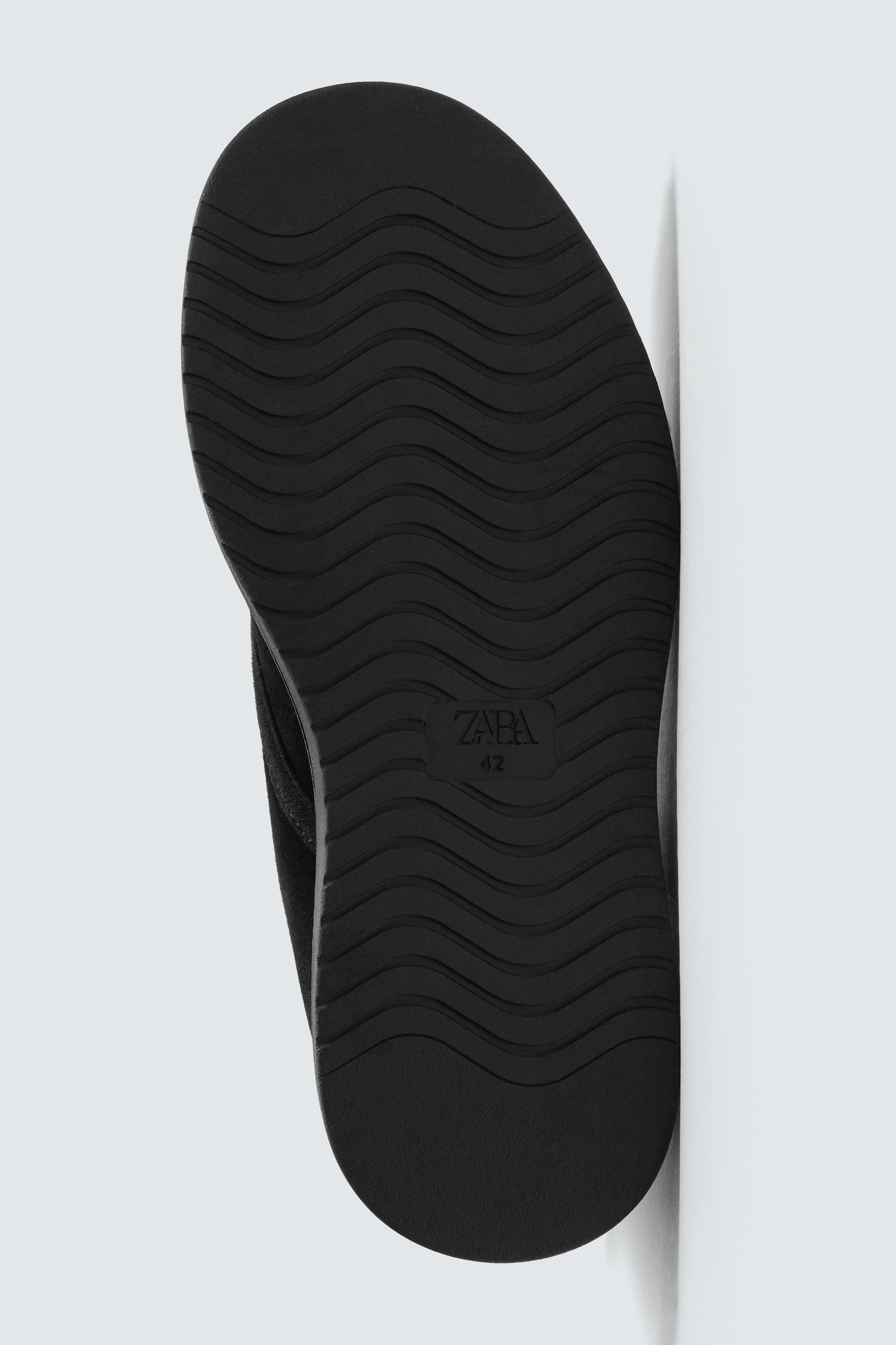 BOTTES EN CUIR À LACETS